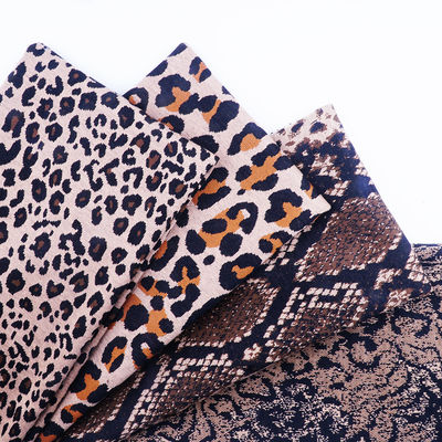 Tecido de denim estirado em 4 vias, de secagem rápida e com padrão de leopardo